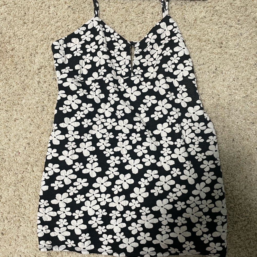 Mini summer dress worn once. Comes to a little above the knee.